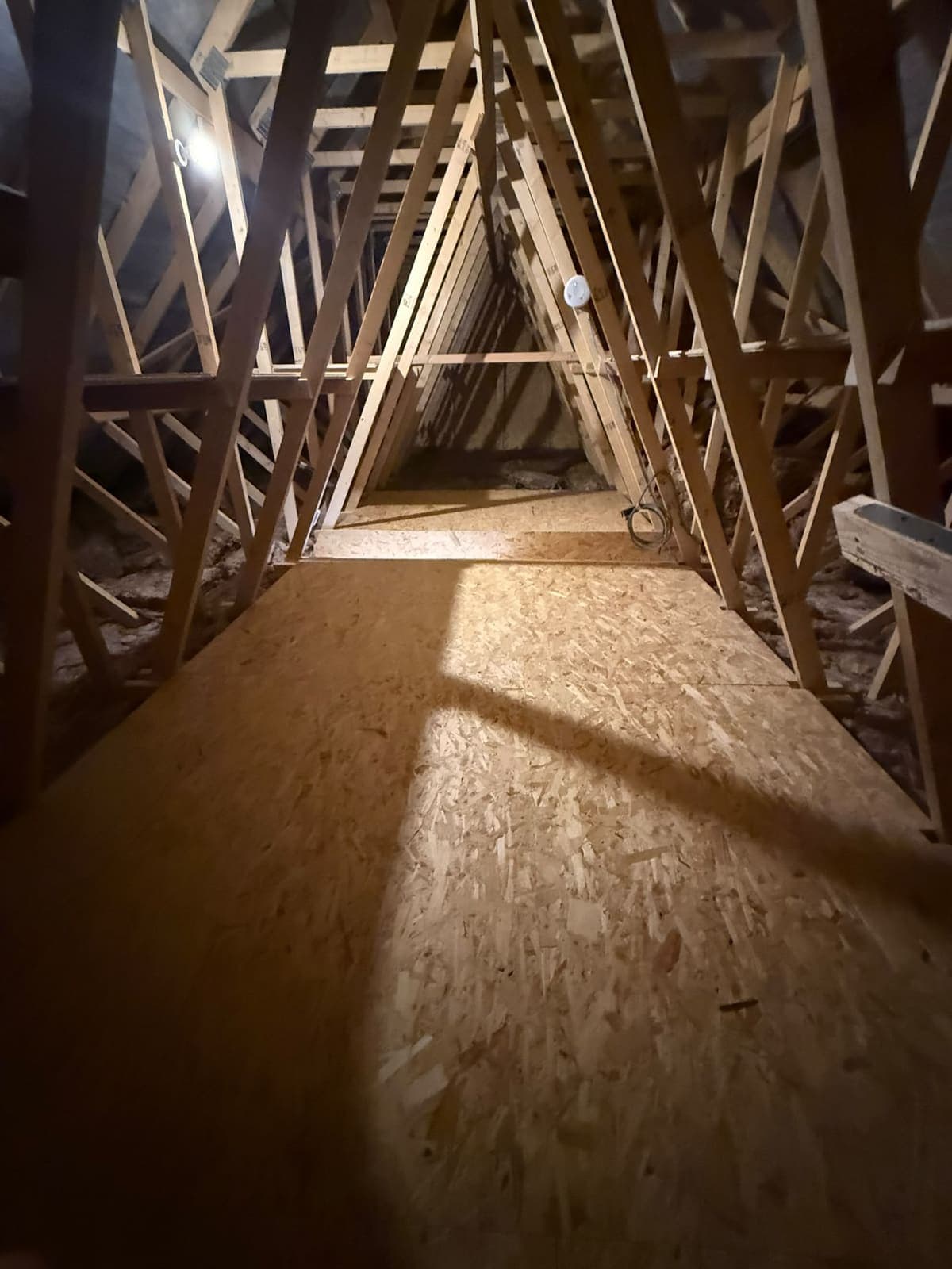 Boarded storage run through the roof trusses