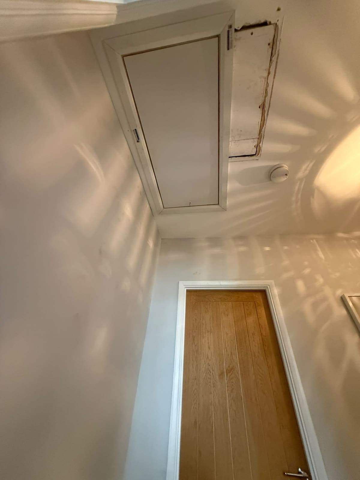 New loft hatch closed and finished flush with the landing ceiling