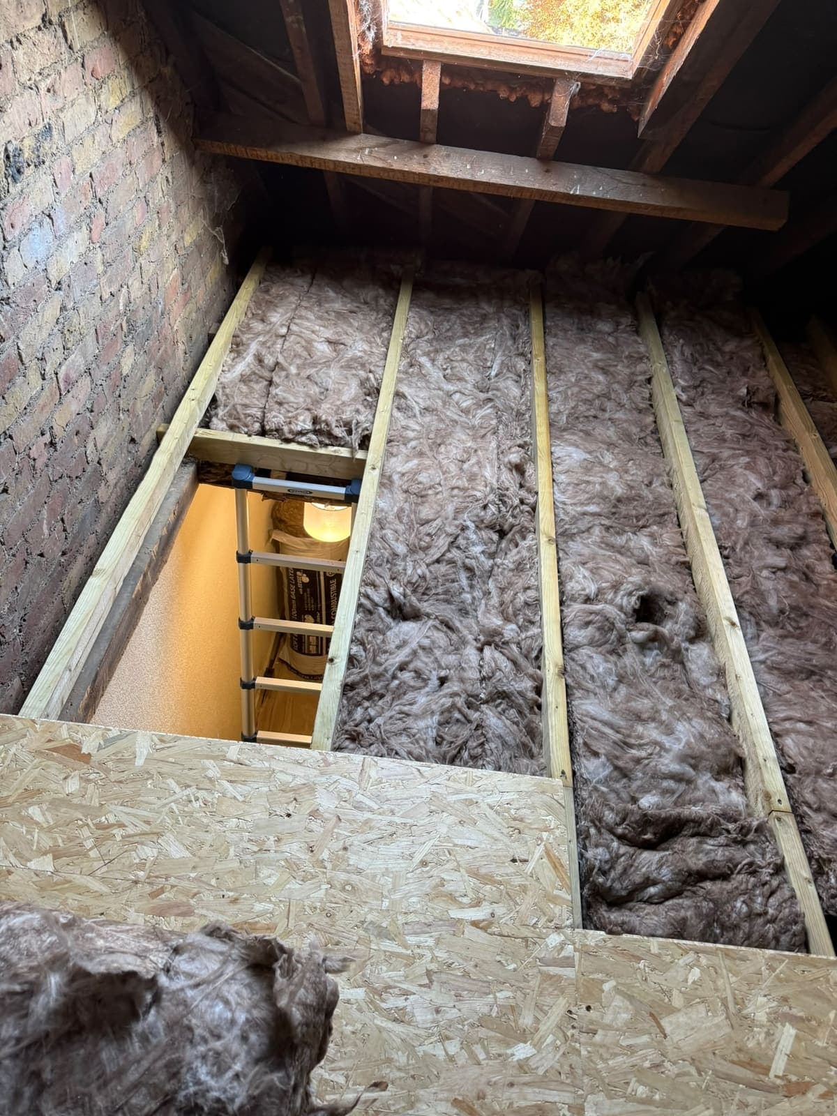 In progress: new timber subframe and insulation going in before the boards