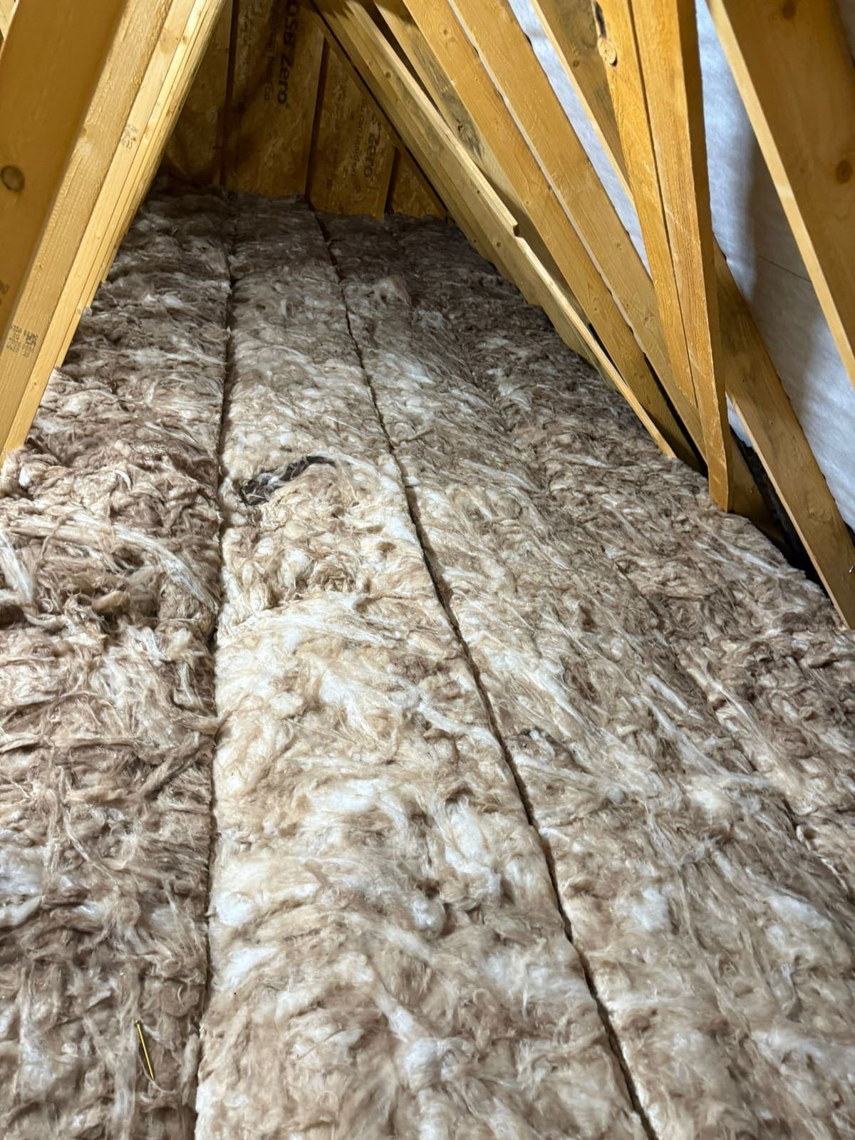 Before: insulation across the loft with no storage floor